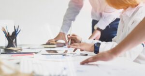 business people looking at paperwork