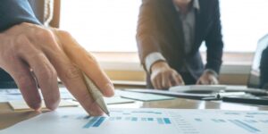 business people looking at paperwork