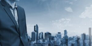 business man in front of skyline